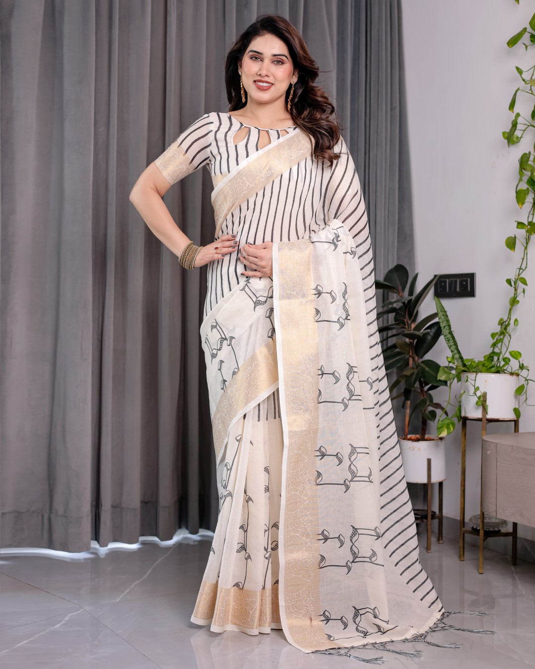 Handloom Linen Saree with Black Vertical Stripes & Tribal Motifs | Golden Zari Border & Tassel Pallu | Attached Blouse | 5.5m Saree + 0.8m Blouse(Pack of 1)
