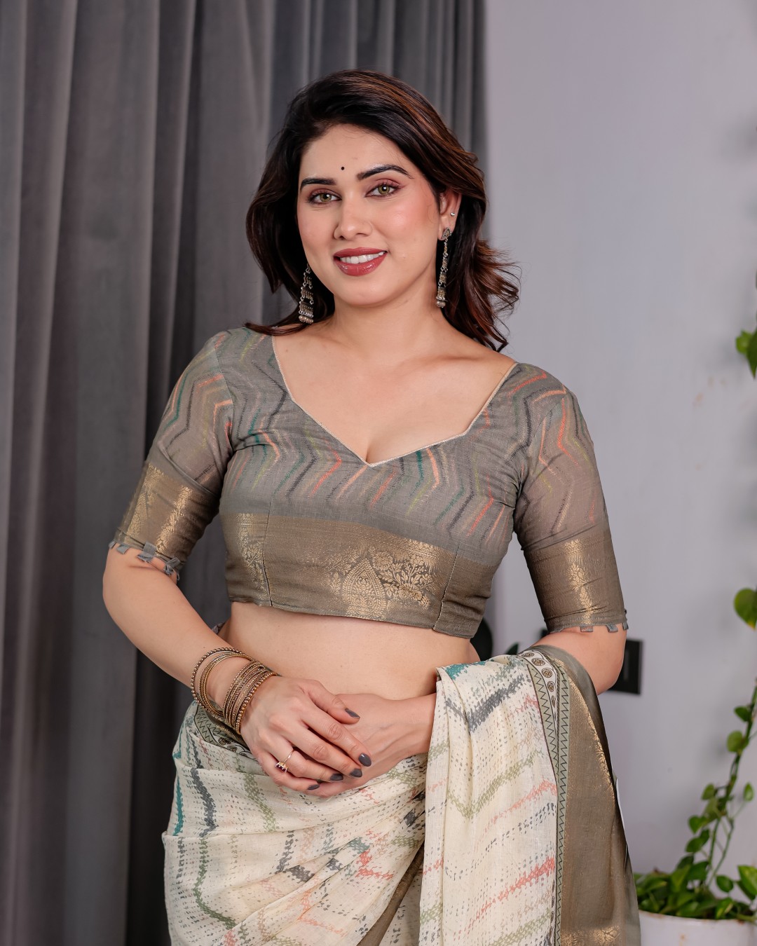 Elegant Cream & Gold Woven Ikat Silk Saree with Designer Border With Tassles(Pack of 1)