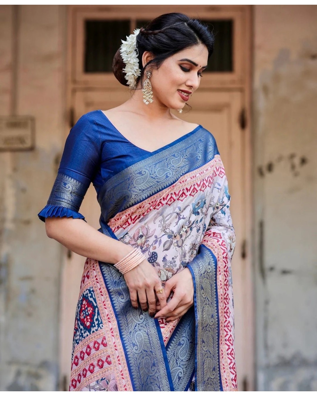 Ivory and Navy Blue Tussar Silk Saree with Floral Elegance and Ornamental Zari Work (pack of 1)