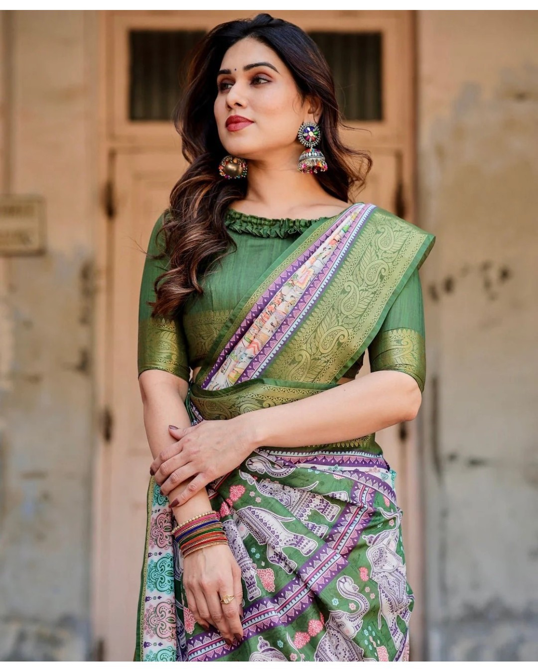 Ivory and Green Tussar Silk Saree with Elephant Motifs and Intricate Zari Border (pack of 1)