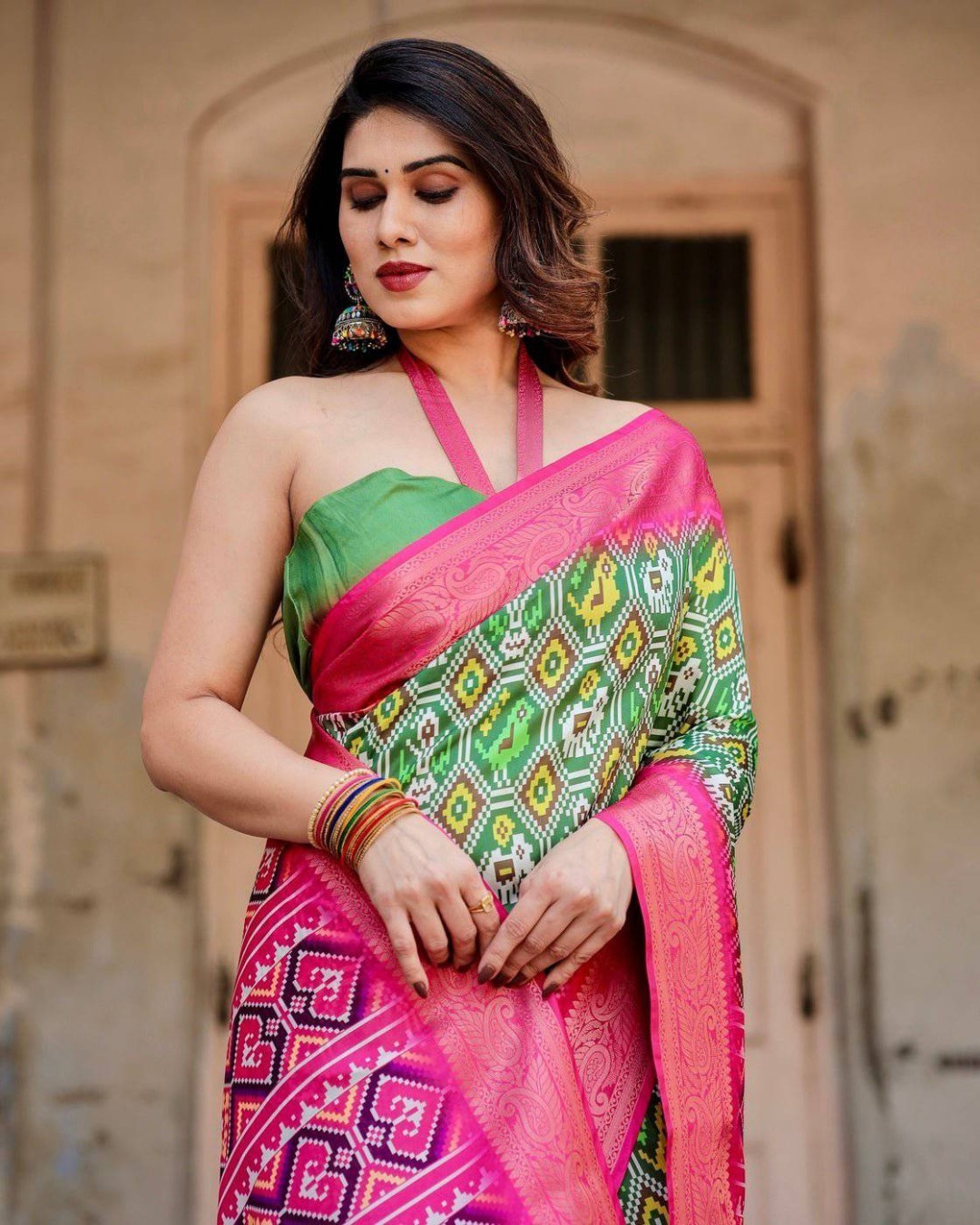 Green and Pink Tussar Silk Saree with Vibrant Ikat Patterns and Zari Border (pack of 1)