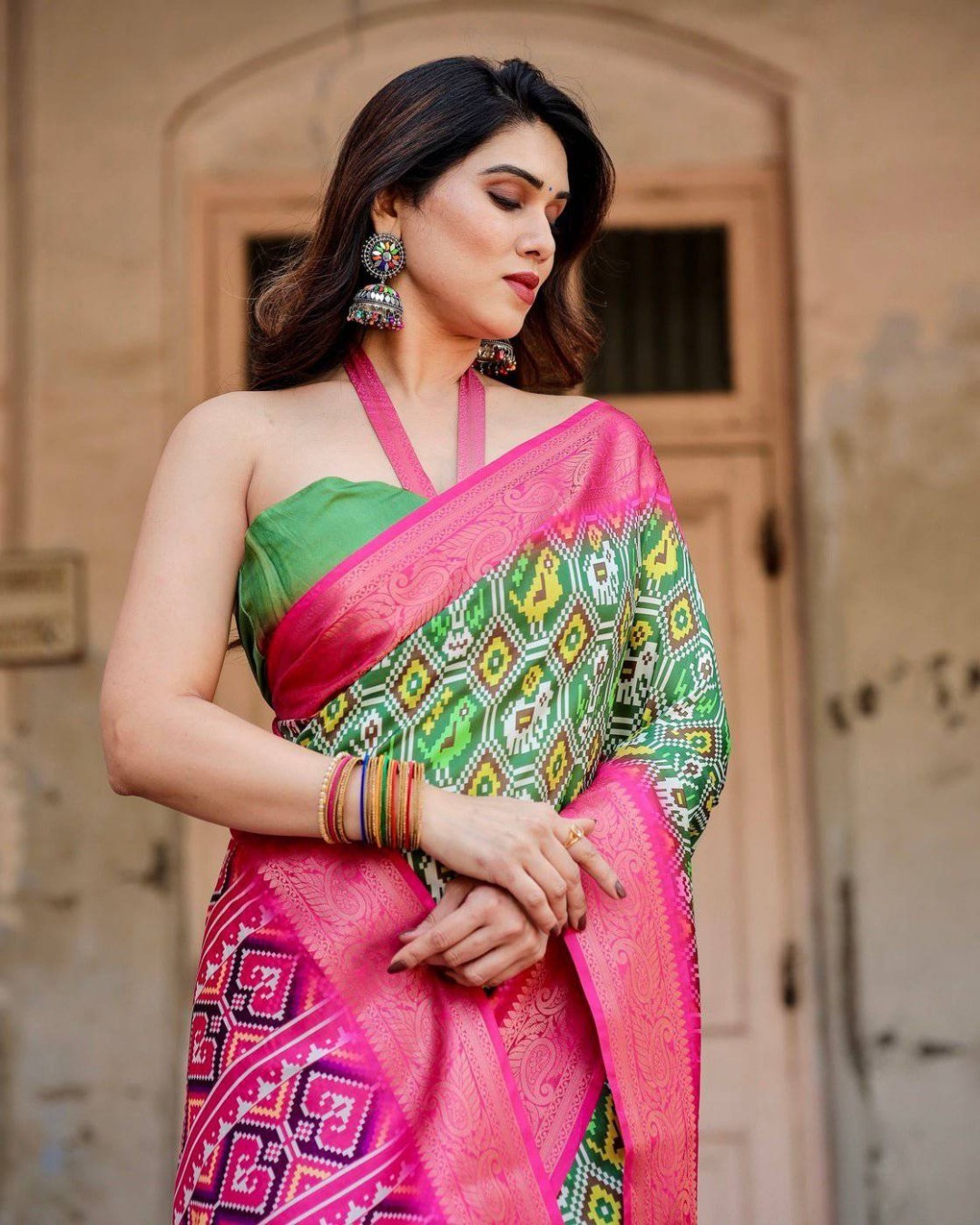 Green and Pink Tussar Silk Saree with Vibrant Ikat Patterns and Zari Border (pack of 1)